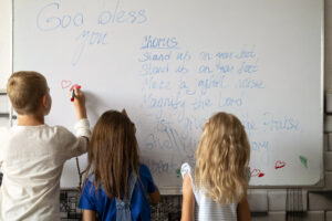 Back View Kids Writing Whiteboard