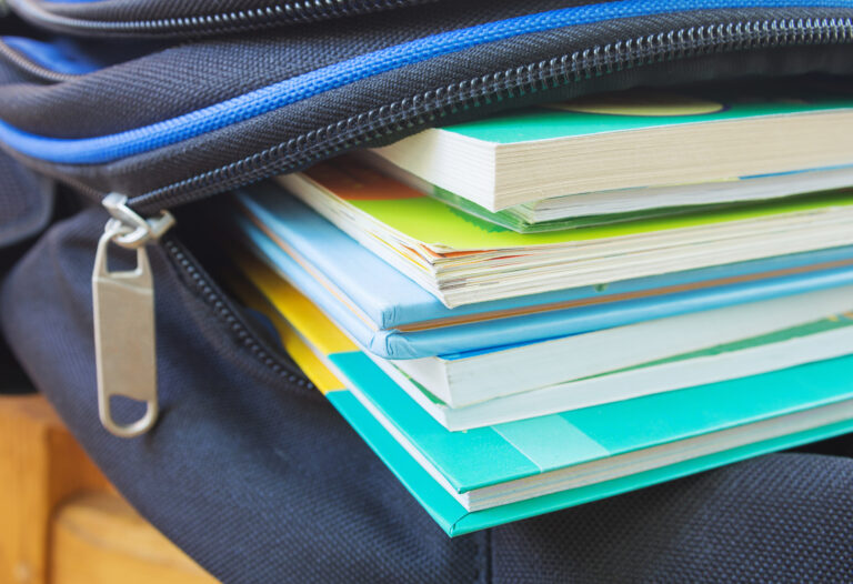 Textbooks In The School Backpack, Education Concept. Selective Focus.