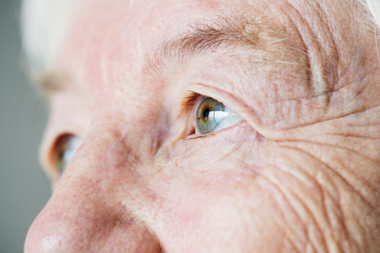 Closeup Side Portrait Of White Elderly Woman's Eyes