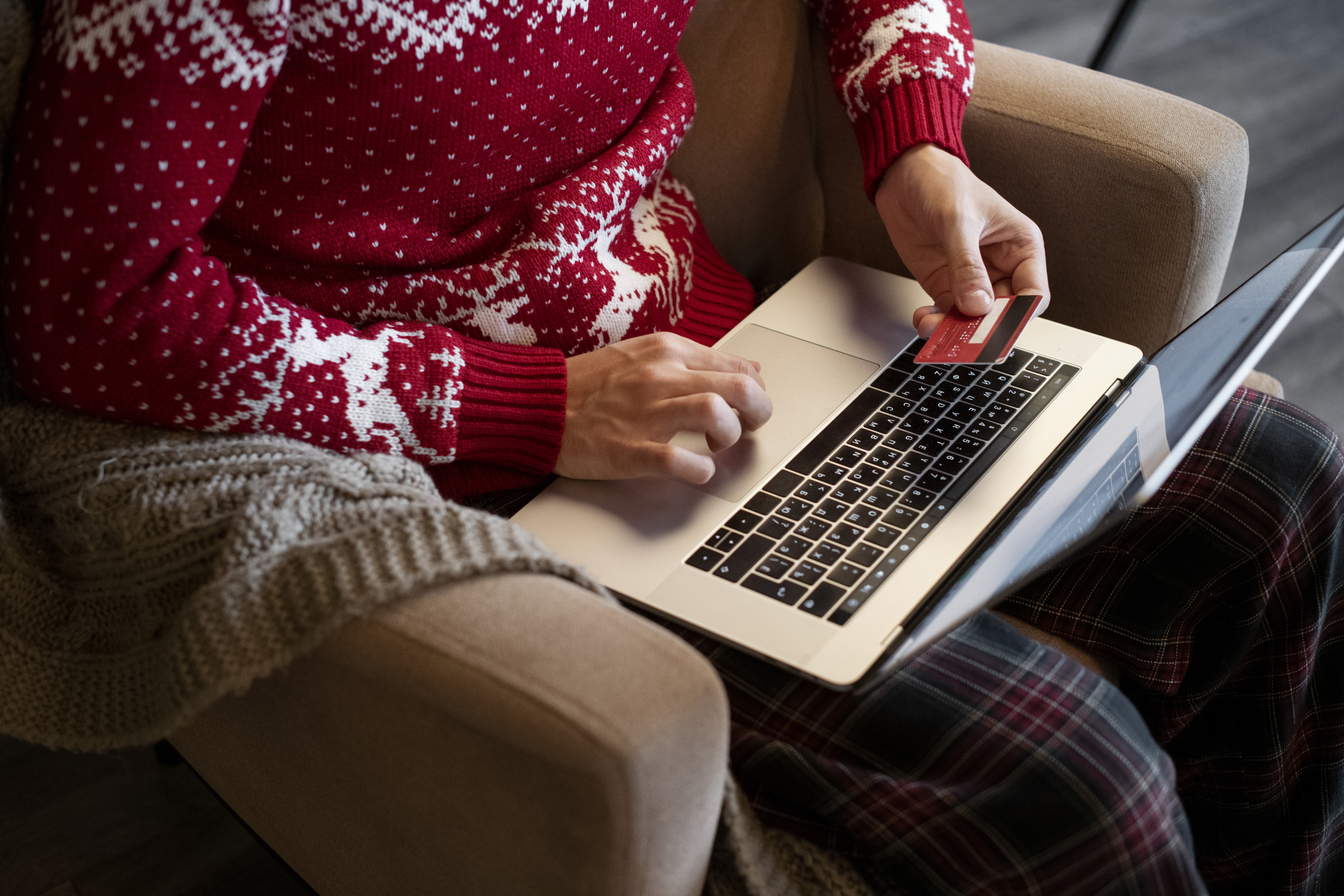 Couple Giving Each Other Christmas Gifts